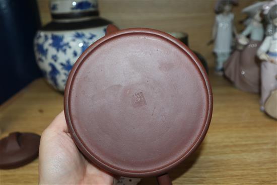 A Chinese squat baluster vase, crackle-glazed in green and red, a blue and white ginger jar and cover and a redware teapot